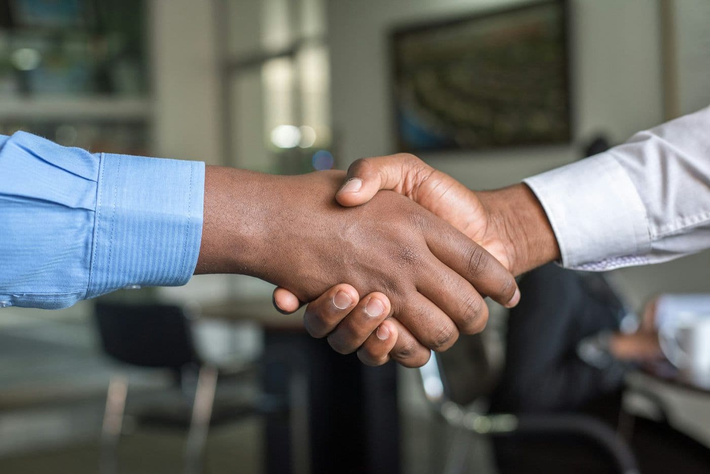 Employer and ANT recruiter shaking hands